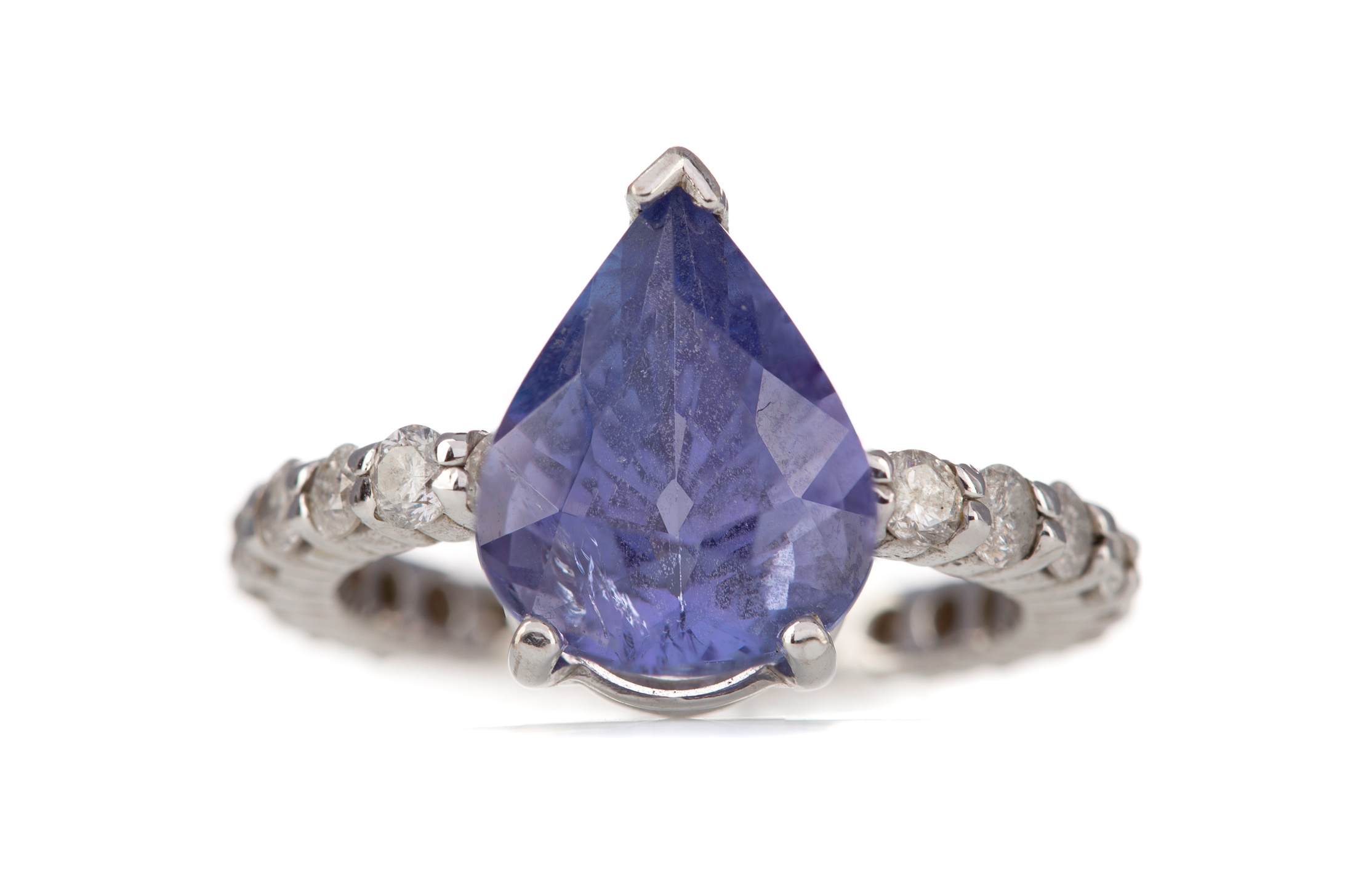 A TANZANITE AND DIAMOND RING