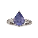 A TANZANITE AND DIAMOND RING