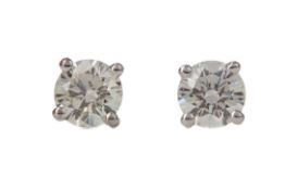 A PAIR OF DIAMOND STUD EARRINGS