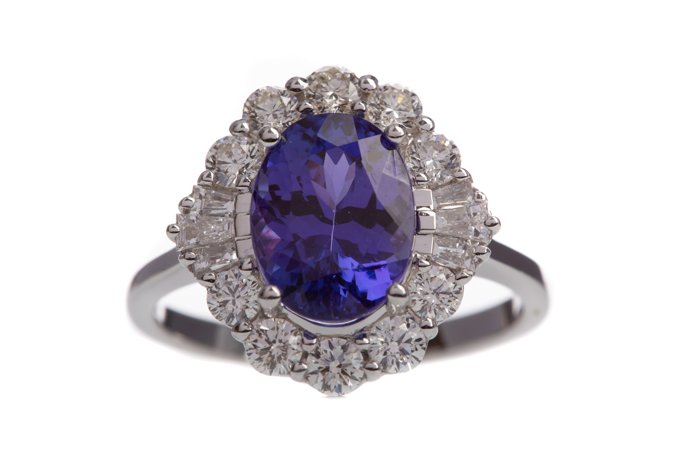A CERTIFICATED TANZANITE AND DIAMOND RING