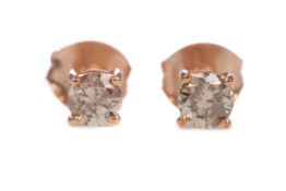 A PAIR OF ROSE GOLD DIAMOND STUD EARRINGS