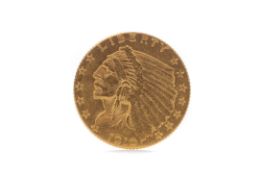 A GOLD INDIAN HEAD 2 1/2 DOLLAR COIN DATED 1910