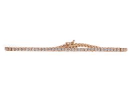 A ROSE GOLD DIAMOND TENNIS BRACELET