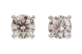 A PAIR OF DIAMOND STUD EARRINGS