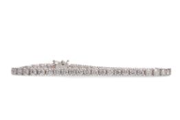 A DIAMOND TENNIS BRACELET