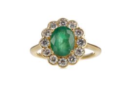 AN EMERALD AND DIAMOND RING