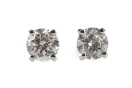 A PAIR OF DIAMOND STUD EARRINGS