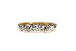 A CERTIFICATED DIAMOND FIVE STONE RING