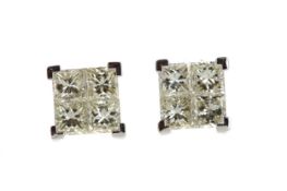 A PAIR OF DIAMOND QUAD EARRINGS