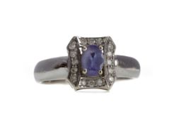 A TANZANITE AND DIAMOND RING