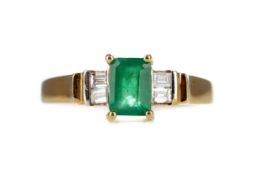 AN EMERALD AND DIAMOND RING