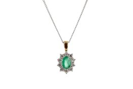 AN EMERALD AND DIAMOND PENDANT