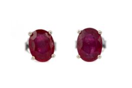 A PAIR OF TREATED RUBY EARRINGS