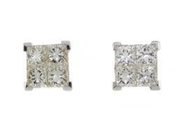 A PAIR OF DIAMOND QUAD EARRINGS