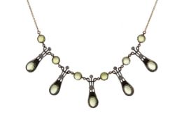 A PERIDOT AND DIAMOND NECKLACE