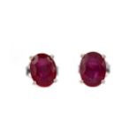 A PAIR OF TREATED RUBY EARRINGS