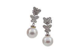 A PAIR OF PEARL AND DIAMOND EARRINGS