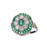 AN EMERALD AND DIAMOND RING