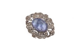 A TANZANITE AND DIAMOND RING