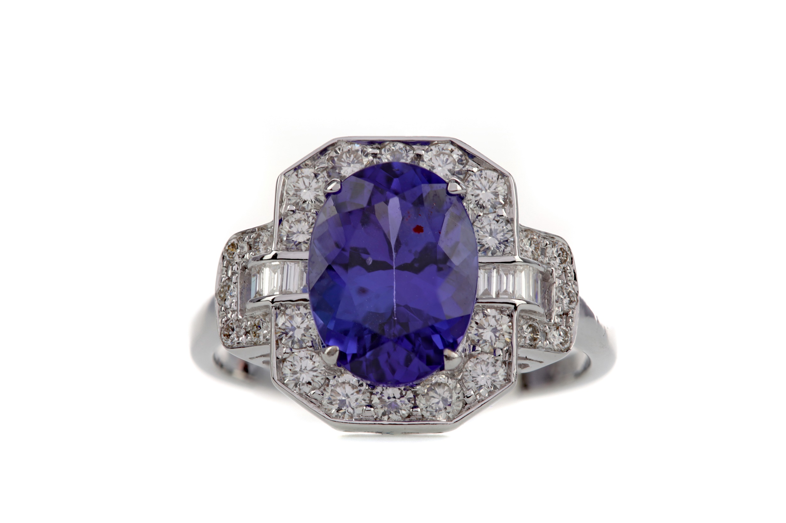 A TANZANITE AND DIAMOND RING