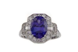 A TANZANITE AND DIAMOND RING