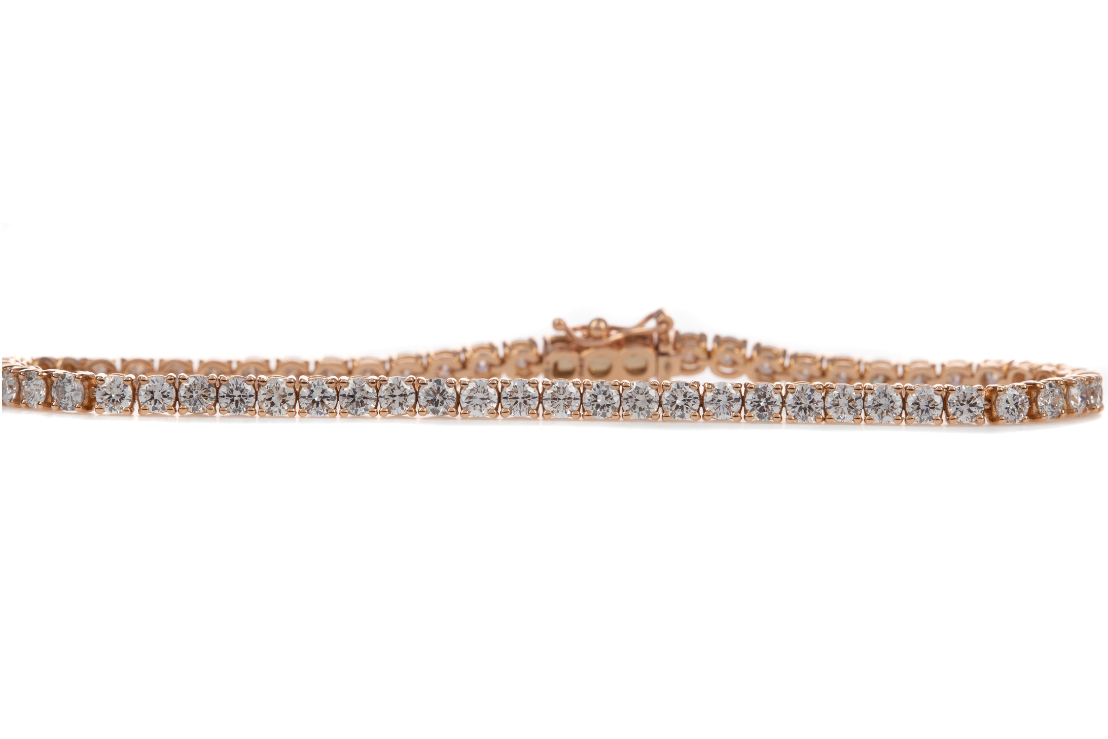 A ROSE GOLD DIAMOND TENNIS BRACELET