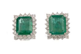 A PAIR OF EMERALD AND DIAMOND EARRINGS