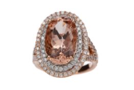 A MORGANITE AND DIAMOND RING