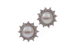 A PAIR OF PEARL AND DIAMOND STUD EARRINGS