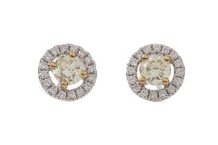 A PAIR OF CERTIFICATED YELLOW DIAMOND STUD EARRINGS