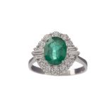 AN EMERALD AND DIAMOND RING