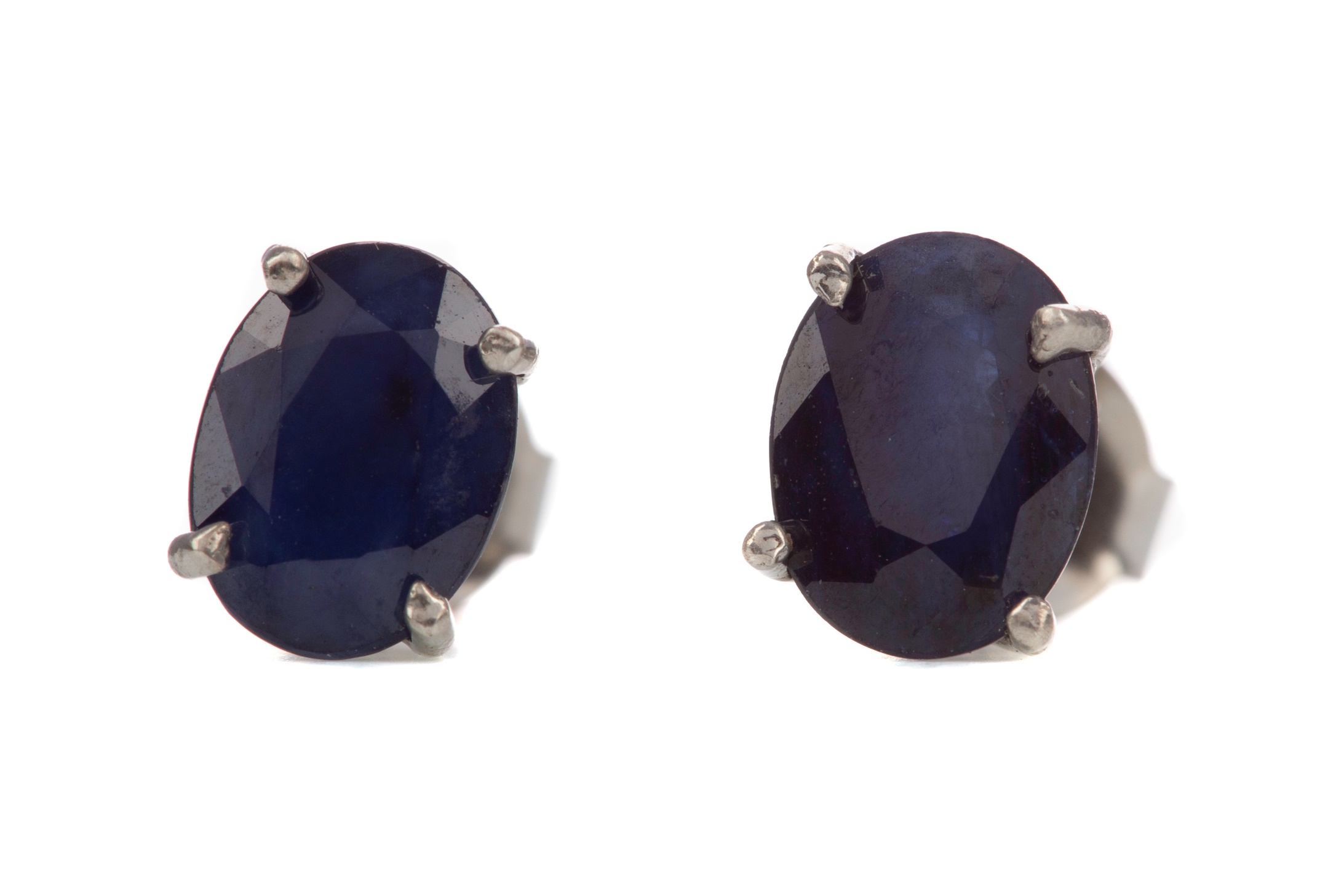 A PAIR OF TREATED SAPPHIRE STUD EARRINGS