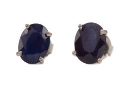 A PAIR OF TREATED SAPPHIRE STUD EARRINGS