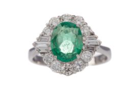 AN EMERALD AND DIAMOND RING