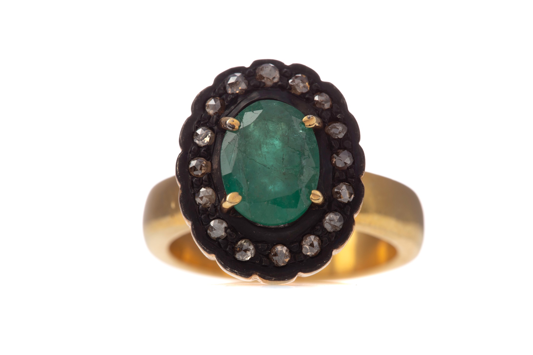 AN EMERALD AND DIAMOND RING