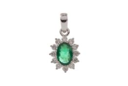 AN EMERALD AND DIAMOND PENDANT