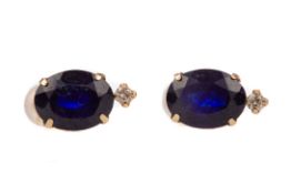 A PAIR OF TREATED SAPPHIRE AND DIAMOND EARRINGS