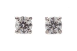 A PAIR OF DIAMOND STUD EARRINGS