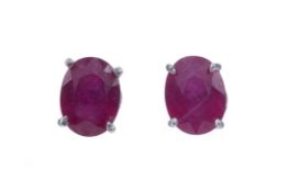 A PAIR OF TREATED RUBY STUD EARRINGS