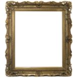 A PERIOD GILT AND CARVED WOODEN FRAME