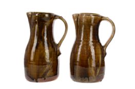 A PAIR OF MARK MELBOURNE STUDIO POTTERY JUGS