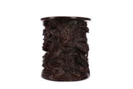 A CHINESE CARVED WOOD BRUSH POT