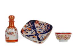 AN EARLY 20TH CENTURY JAPANESE KUTANI BOTTLE WITH STOPPER, TEA BOWL AND IMARI BOWL