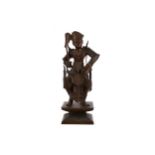 A BALINESE CARVED WOOD FIGURE