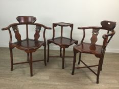 A PAIR OF CHINESE HARDWOOD CORNER CHAIRS AND A TWO TIER TABLE