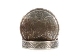 A MIDDLE EASTERN WHITE METAL CIRCULAR LIDDED BOX