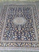A PERSIAN HAND KNOTTED WOOL CARPET,