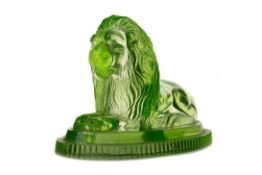 A LATE VICTORIAN URANIUM GLASS FIGURE OF A RECUMBANT LION