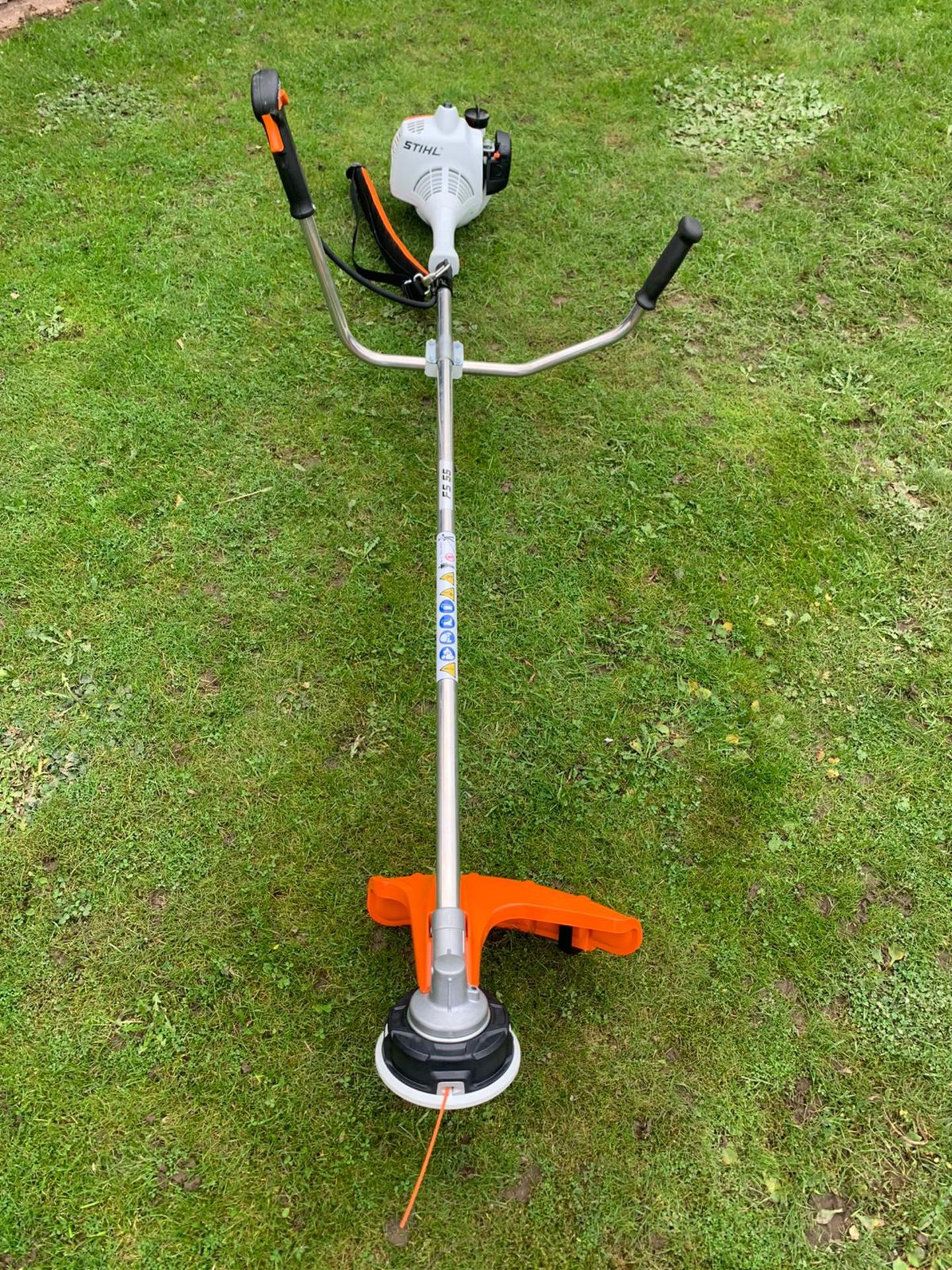 BRAND NEW AND UNUSED STIHL FS55 STRIMMER, C/W MANUAL AND GOGGLES *NO VAT*
