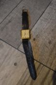 MENS ROTARY QUARTZ WRIST WATCH WITH DATE AND BLACK ALIGATOR STYLE STRAP, APPROX 30MM FACE *NO VAT*